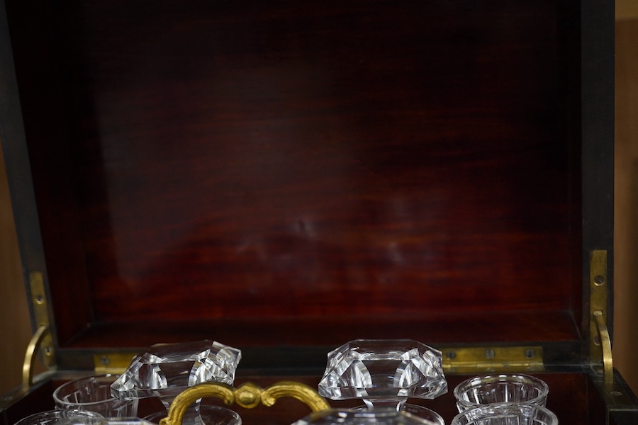 A 19th century Boulle panelled and decorative brass work liqueur cabinet, the interior fitted with gilt fitments, four cut glass decanters and sixteen liqueur glasses, 34cm wide, 26cm high. Condition - minor scratches to